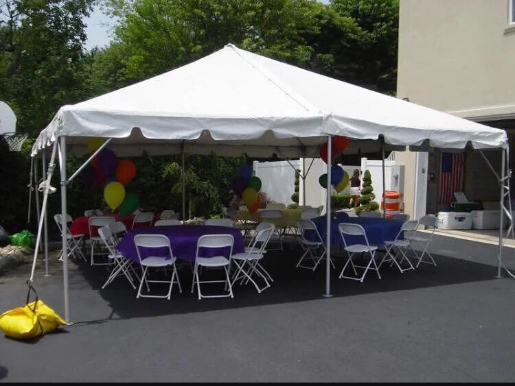 Residential backyard party tent with colorful decorations