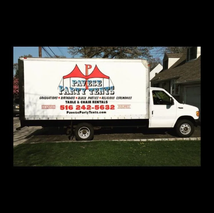Tables and chairs rental setup under tent